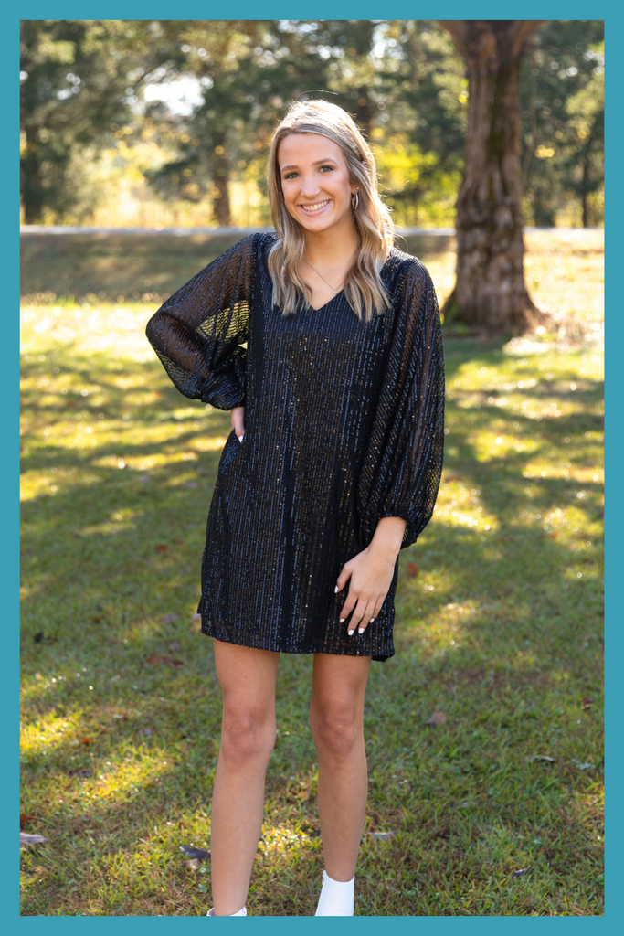Women's Dresses and Rompers! Beautiful Black Dress. Shop Online or In Person with Podos Boutique, We Offer Women’s Clothing, Accessories, and Screen Printing. Free Shipping on Eligible Purchases. Located in Calera, AL.