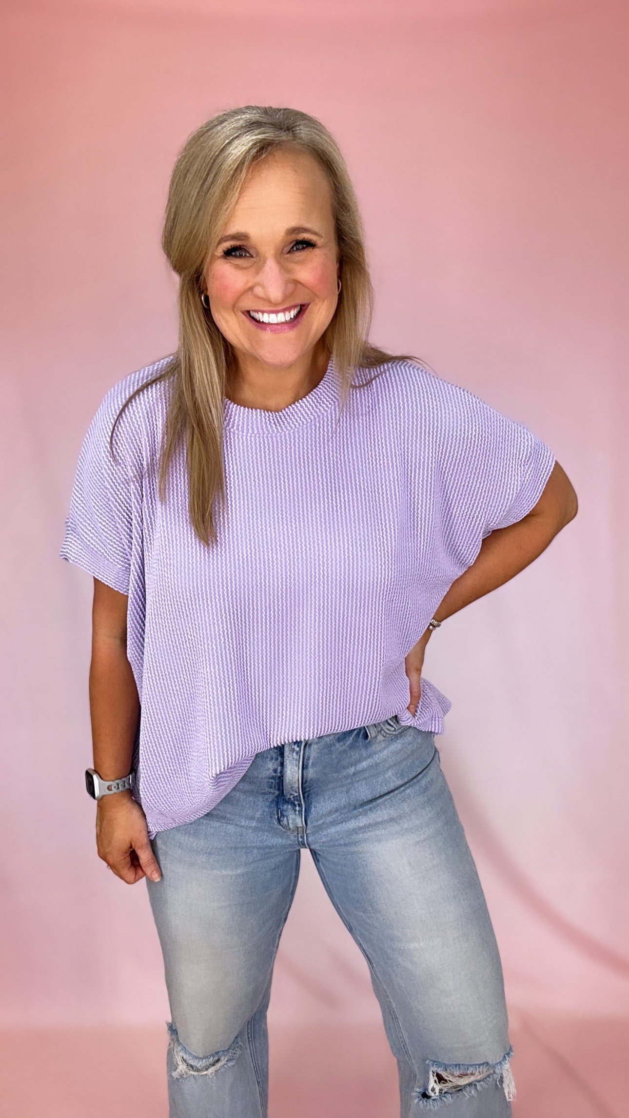 Girl Wearing A Purple Scoop Neck Ribbed Knit Short Sleeve Top | Podos Boutique